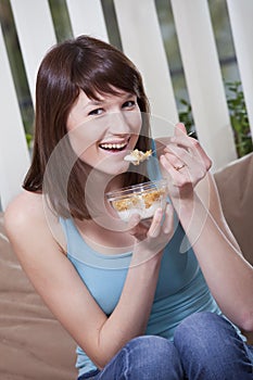 Woman with corn flakes
