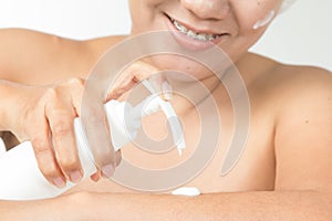 Woman with cosmetic cream