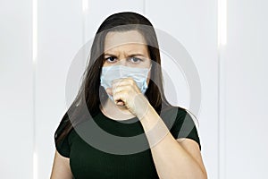 Woman cough with virus protection mask against pandemic of coronavirus COVID-19, isolated