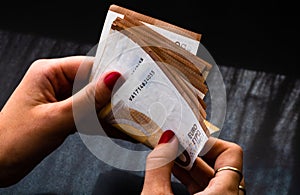 Woman counting money, counting EURO close up