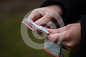 Woman counting money, counting EURO close up