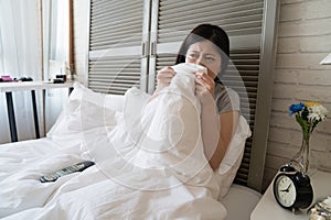 Woman cover her sight with blanket