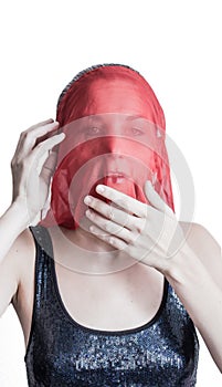 Woman covered with a red veil