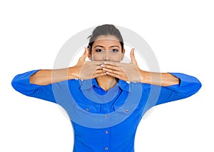 Woman covering closed mouth