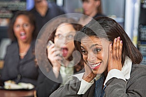 Woman Covering Ears