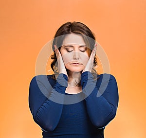 Woman, covering ears. Hear no evil concept