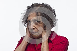 Woman covering her ears, horizontal