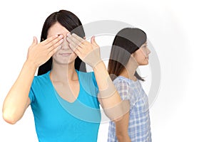 Woman covering her eyes