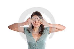 Woman covering her eyes