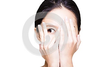 woman covering her eyes by hands