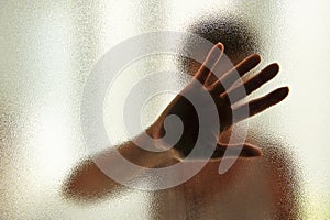 Woman covering her face