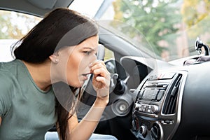 Woman Covering Her Nose From Bad Smell