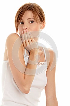 Woman covering mouth