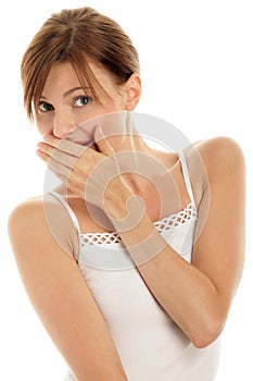 Woman covering mouth