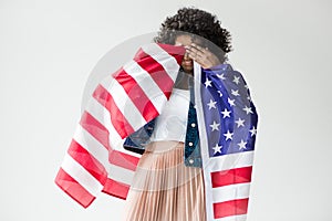 Woman cowered with american flag