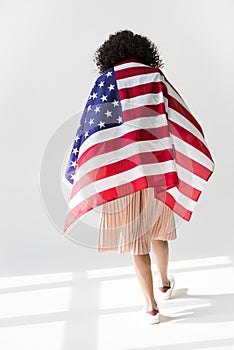 Woman cowered with american flag