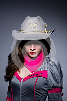 Woman cowgirl with gun