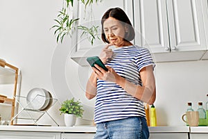 Woman in cozy homewear engages with