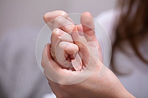 Woman Cracking Their Knuckles