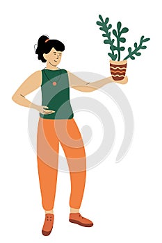 Woman with a crassula ovata potted plant