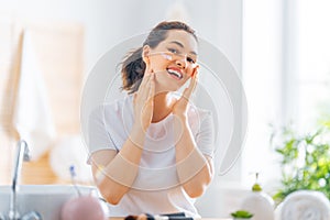 Woman with cream for her face