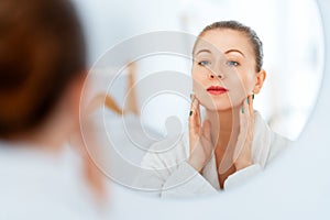 woman with cream for her face