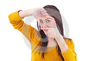 Woman creating a frame with her fingers