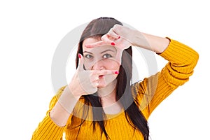 Woman creating a frame with her fingers