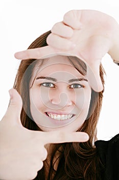 Woman creating a frame with her fingers