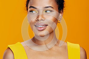 Woman creative black african colourful portrait beautiful smile make-up beauty yellow face