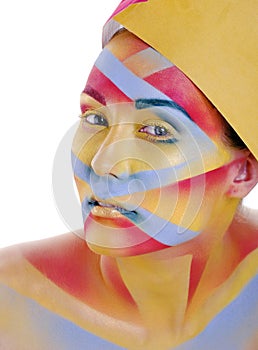 Woman with creative geometry make up, red, yellow, blue closeup smiling colored, bright concept