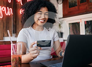 Woman, credit card and laptop in cafe, ecommerce and discount purchase. Young black woman, girl and female customer