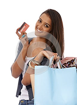 Woman, credit card and portrait with shopping bags in studio for discount, retail and sale for offer. Girl, store and