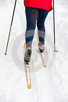 Woman cross country skier on sunny day