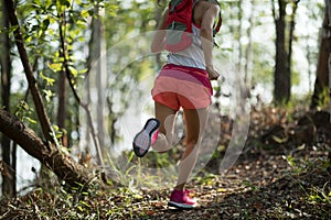 Woman cross country trail running