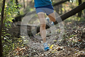 Woman cross country trail running