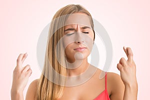 Woman Crossing Her Fingers For Good Luck