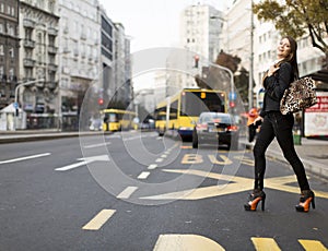 Woman crossing the street