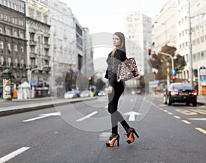 Woman crossing the street