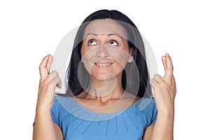 Woman crossing their fingers as sign of luck