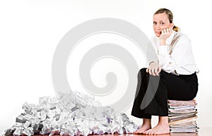 Woman with crumpled papers