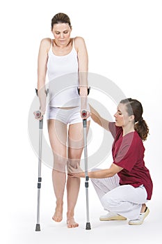 Woman with crutch photo