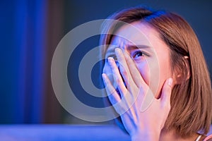 Woman cry while watching movie