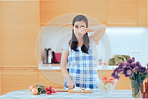 Woman Crying While Chopping Onion at Home