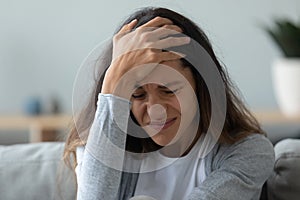 Woman crying feels desperate about divorcement or unhappy love