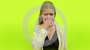 woman crying in space studio on background color yellow