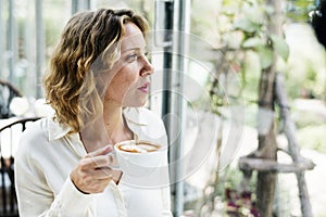 Woman with a cup of coffee