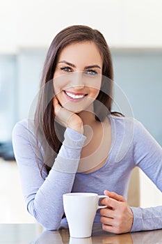 Woman with cup of coffee