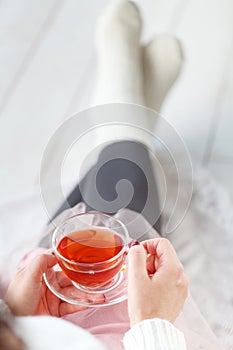 Woman with Cup tea Rest Plaid, Foot with White Socks