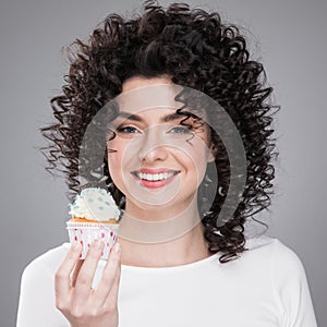 Woman with cupcake